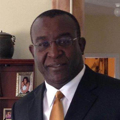 Portrait of Professor Iyalla Peterside, President of Opobo Foundation USA